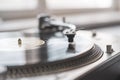 a macro close up record player needle playing the vinyl disc, old fashioned retro music player Royalty Free Stock Photo