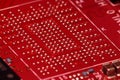 Macro Close-Up of Red PCB Backside with Dense BGA Pad Array Royalty Free Stock Photo