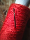 Macro Close-up of red yarn and needle Royalty Free Stock Photo