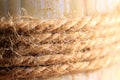 Macro close-up of rope tied around a piece of wood