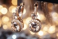 Macro shot golden earings with amazing ivory diamonds in a jewelry shop. Royalty Free Stock Photo