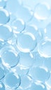 Macro Close-up of Transparent Water Gel Beads on a Light Blue Background Royalty Free Stock Photo