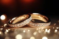 Macro close up of two perfect wedding rings with amazing ivory diamonds in a jewelry shop. Royalty Free Stock Photo