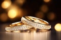 Macro close up of two perfect wedding rings with amazing ivory diamonds in a jewelry shop. Royalty Free Stock Photo