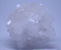 A macro close up view of calcium chloride crystal isolated on white