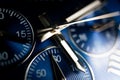 Macro Close Up of Watch Hands on Blue Faced Chronograph