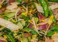 Macro closeup of a cooked asian vegetable mix, healthy vegan food background