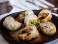 Macro closeup of escargot snails in French cafe, Paris, France Royalty Free Stock Photo