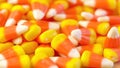 Macro closeup of Halloween traditional Candy Corn treats. Royalty Free Stock Photo