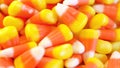 Macro closeup of Halloween traditional Candy Corn treats. Royalty Free Stock Photo