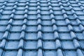 Macro closeup of icy rooftop tiling covered in snow crystals, cold winter season, architecture background