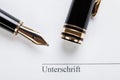 Macro closeup sign document contract pen filler