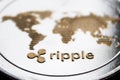 Macro coin cryptocurrency ripple and word map.