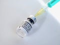 Macro of Comirnaty vaccination ampoule with a syringe against Covid-19 or Corona virus Royalty Free Stock Photo