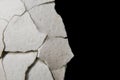 Macro of cracked egg shell on a black background Royalty Free Stock Photo