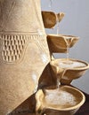 Arabic fountain with water running through bowls