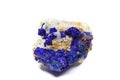 Macro deep blue azurite crystal cluster on white calcite and albite matrix