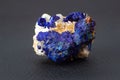 Macro deep blue azurite crystal cluster on white calcite and albite matrix