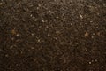 Macro detail of dark brown colored artisan paper texture with natural fibres Royalty Free Stock Photo