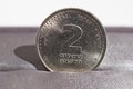 Macro detail of a metal coin of two Shekels (Israeli currency New Shekel, ILS)
