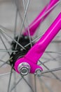 Macro detail of a purple fork on a fixie bike Royalty Free Stock Photo