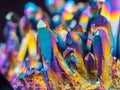 Macro detail of Titanium rainbow aura quartz crystal cluster stone with shallow depth of field