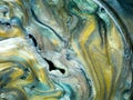 Glossy pearlescent pigments mixed with oil, detail Royalty Free Stock Photo