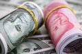 Macro of dollar bills and China yuan or Renminbi banknotes, Chinese and US economy finance commercial business, money closeup Royalty Free Stock Photo