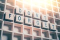 Macro Of A Don`t Forget Reminder Formed By Wooden Blocks In A Typecase