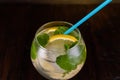 Macro of drink with lemon and mint. Straw in a glass. Cocktail with lemon and mint. View from above Royalty Free Stock Photo