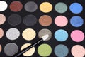 Macro eye shadow palette makeup with brush Royalty Free Stock Photo