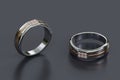 Macro focus of two diamond white gold ring on black background from design with 3d Royalty Free Stock Photo