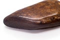 Macro Focused Tumbled Dark brown and shiny bronze bronzite stone Royalty Free Stock Photo