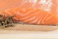 Macro fresh salmon and dried rosemary