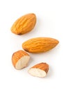 Macro of full and halfed shelled almond kernels Royalty Free Stock Photo
