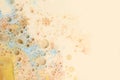 Macro Gold bubble drops. Abstract flow color blots beige horizontal background Royalty Free Stock Photo