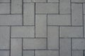 Macro of grey concrete pavement with herringbone layout Royalty Free Stock Photo