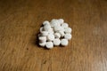 Macro of handful of white tablets