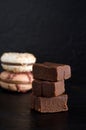 Macro Image of Chocolate Fudge Brownies and Macarons Royalty Free Stock Photo