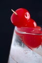Macro Image Delicious Red Cocktail Cherries in a Glass with Ice