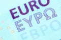 Macro image of Euro banknote as symbol of economy, finances and business in European Union. Selective focus