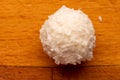 Macro image of heavenly coconut balls, spherical in shape with a crispy wafer shell and a creamy filling of coconut and Royalty Free Stock Photo