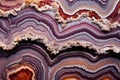 macro image of the intricate patterns in a slice of agate stone
