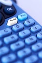 Closeup of a keyboard with blue and white buttons