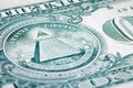 Macro image of one dollar bill with a truncated pyramid and an all-seeing eye