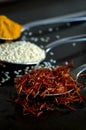 Macro Image of Saffran in Spoon with Curcuma and Sesame Seeds Royalty Free Stock Photo