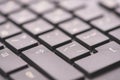 Macro keyboard keys, an angle view, soft background with copy space