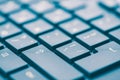 Macro keyboard keys, an angle view, soft background with copy space