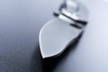 Macro Of A Knife Point Of An Opened Military Knife Which Is Lying On Dark Ground