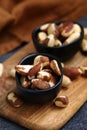 Macro. Large brazil nuts in a bowl. Peeled nuts